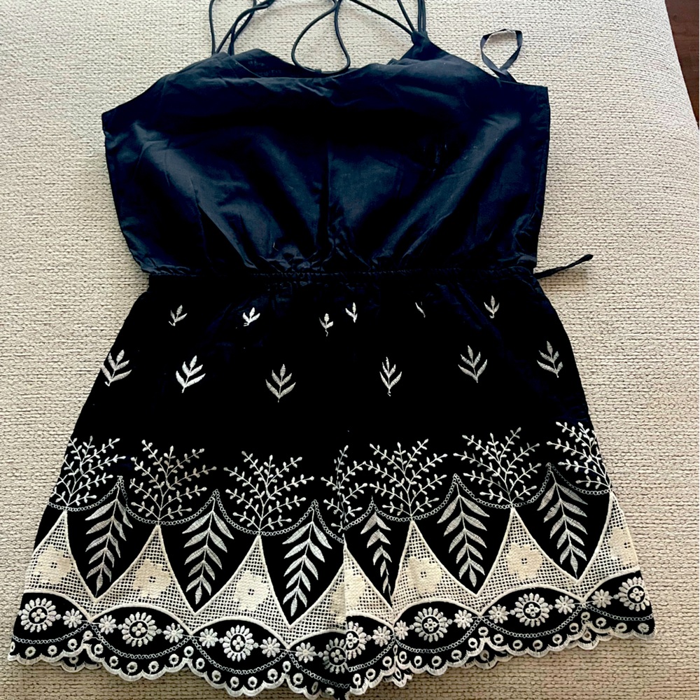 Black Romper
With cute detail